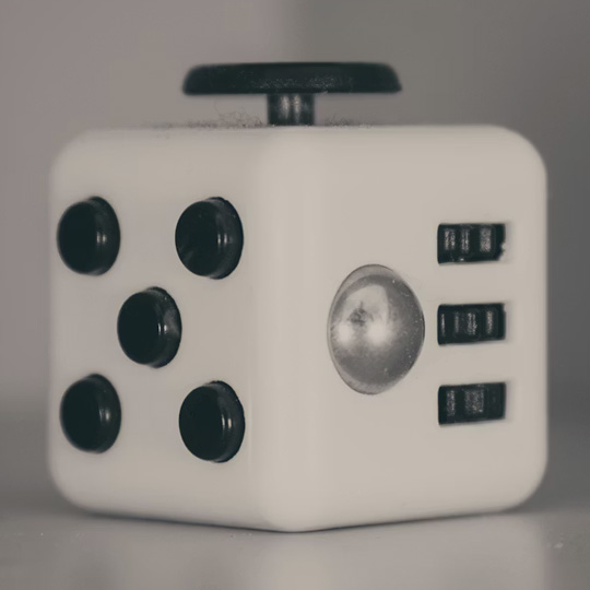 <br><audio controls src='/audio/fidget.mp3'></audio><br>Various sounds from the use of a fidget cube. It features multiple buttons/swtiches for a verity of sounds and textures.<br>Grant. B (2019). A close up of a dice on a table. Unsplash. https://unsplash.com/photos/a-close-up-of-a-dice-on-a-table-ey28WQOaTXk