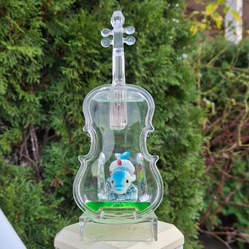 This object is a lamp souvenir thats filled with oil to make the objects inside float around. I thought it would be interesting to model a clear object, as I hadn't tried using transparent materials beforehand.